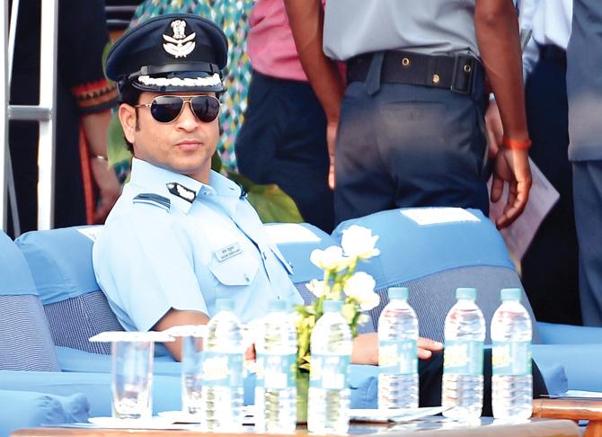 IAF Hon Group Captain Sachin Tendulkar during the Air Force Day parade at the Hindon air base on the outskirts of New Delhi yesterday. pic/afp 