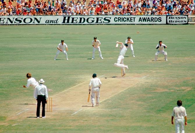 England’s Tony Greig is served a rising delivery from Australia’s Jeff Thomson as wicketkeeper Rod Marsh and slip fielders Ian Chappell, Greg Chappell and Doug Walters (third slip) are alert during the fourth Test at Sydney in the 1974-75 Ashes series. Pic/Getty Images