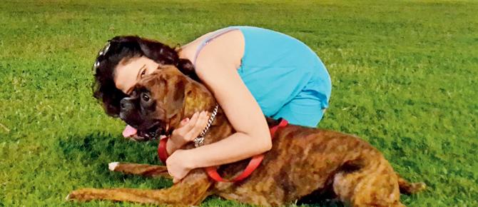 Lakshmi Varyani Makhija , a guest with her pet, Whiskey
