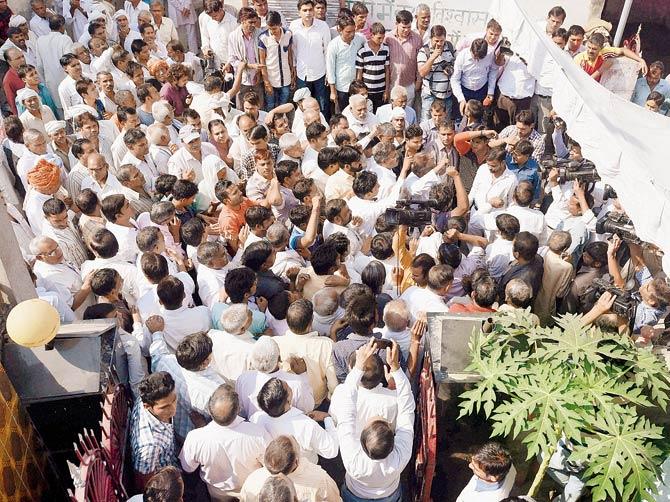 Villagers shout slogans against Haryana CM Manohar Lal Khattar after he visited the Dalit family yesterday. Pic/PTI