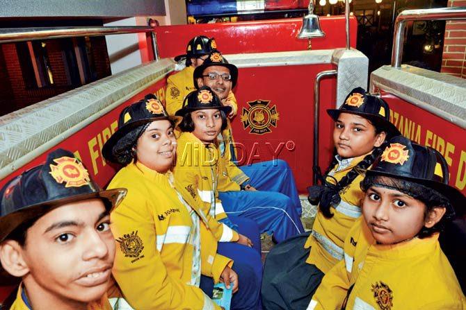 The Olympians rode in a fire brigade vehicle while learning the dos and don’ts of fighting fires. Pics/Sayed Sameer Abedi