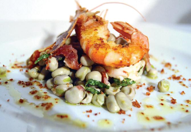 on the menu: Prawn Casserole with Faba Beans cooked with Picada (in pic) is on the festival menu; this includes Catalan Fish Soup with Aioli, Roast Lamb Manchego-style, Albondigas Mar I Muntanya (Meatballs with Cuttlefish combining sea and mountain gastronomy) and Panellets (Sweet Almond Balls)