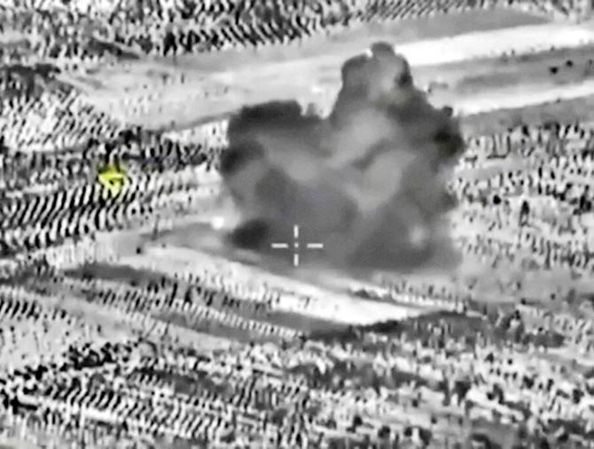 This footage taken from the Russian Defense Ministry official website on Friday, shows an attack made by a fighter jet in Syria