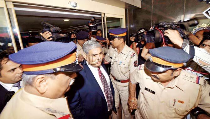 BCCI chief Shashank Manohar emerges from the Cricket Centre, where security had been beefed up following the protest by Sena. Pic/Datta Kumbhar