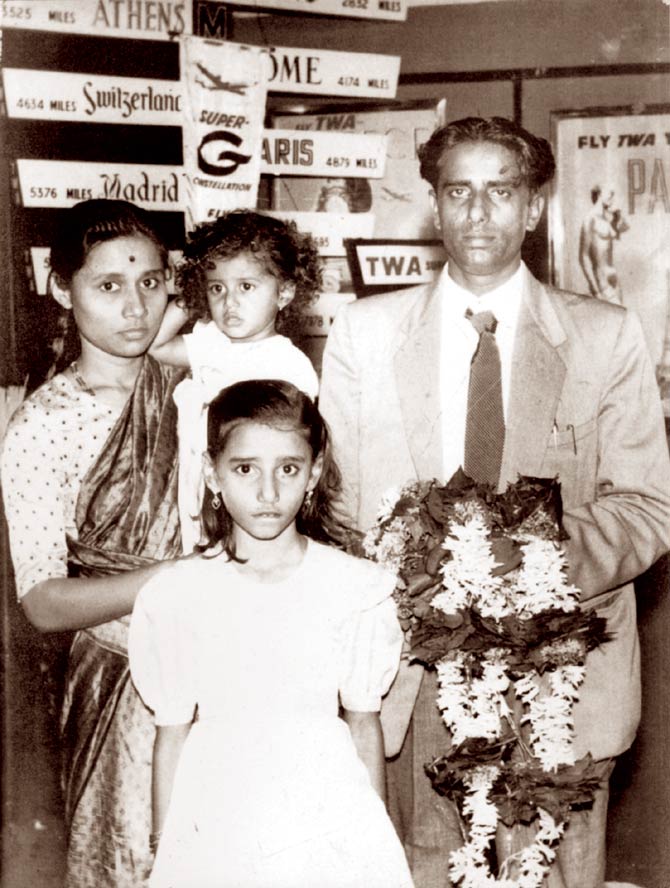 With her parents and elder sister, Anita