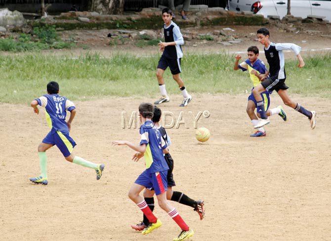 An inter-school football match in progress at St Xavier’s Ground. Let us bring this facility to some standard