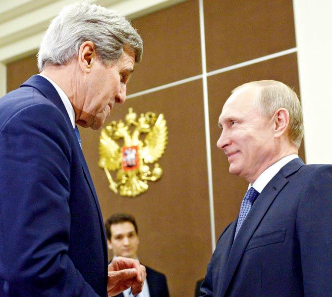 Russia’s President Vladimir Putin (R) shakes hands with US Secretary of State John Kerry. It has been clear for some years now that the US can no longer act alone or only with some allies pursuing their own agenda.  If there has to be victory against IS, it has to be in cooperation with the Russians along with the Iranians. FIle pic/AFP