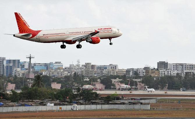 An Air India aircraft prepares to land at the international airport in Mumbai on May 25, 2010. Pic/AFP