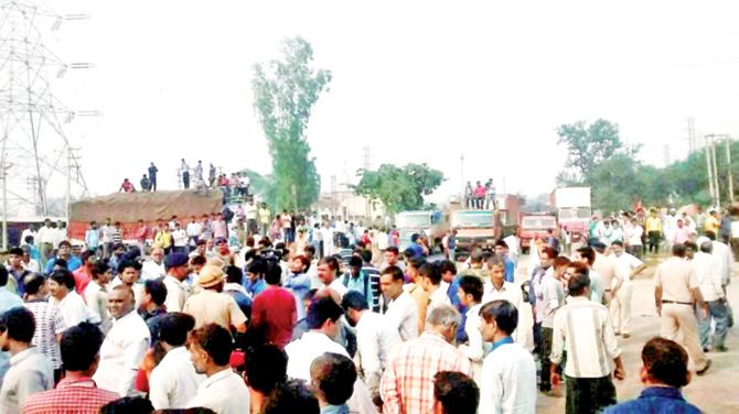 Villagers were protesting the death of two Dalit children.  Pic/PTI