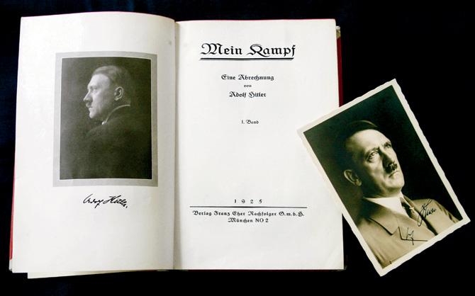 Print and be damned? A signed copy of a first edition of the book on display at an auction House in London on June 14, 2005. Pics/AFP