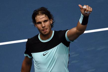 Nadal battles back to down Dimitrov to enter Swiss Indoors quarters