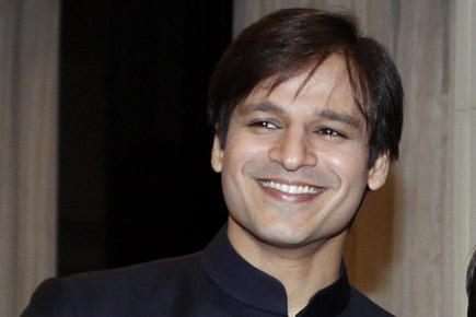 Why did Vivek Oberoi drop Anand from his name?