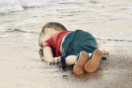 Photographer of drowned Syrian toddler was 'petrified'