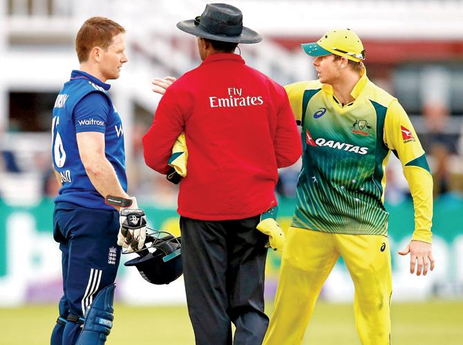 Australia skipper Steven Smith and England captain Eoin Morgan argue after the dismissal of Ben Stokes at Lord’s on Saturday. PIC/Getty Images 