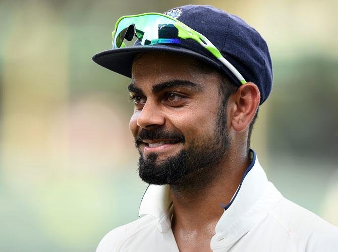 Indian captain Virat Kohli celebrates victory at close of play on the final day of the third and final Test match between Sri Lanka and India at the Sinhalese Sports Club (SSC) in Colombo on September 1, 2015. Pic/AFP