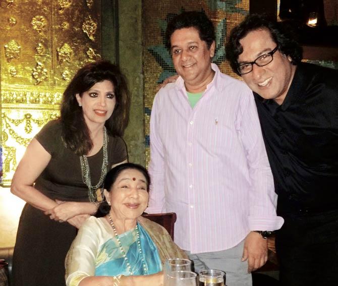 Asha Bhosle is flanked by her son Anand, singer Talat Aziz with wife, Bina in New York
