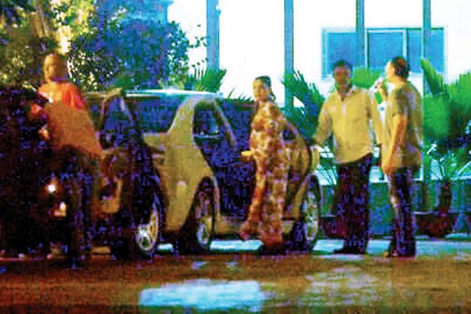 Rani Mukerji (centre) was snapped while getting into a car