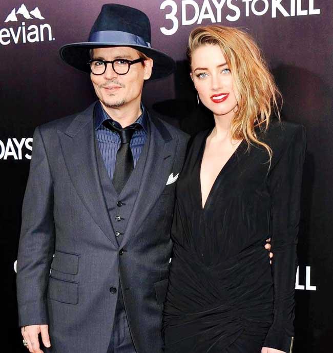 Johnny Depp and Amber Heard. Pic/AFP
