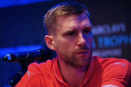 Arsenal defender Per Mertesacker escapes unhurt in car accident
