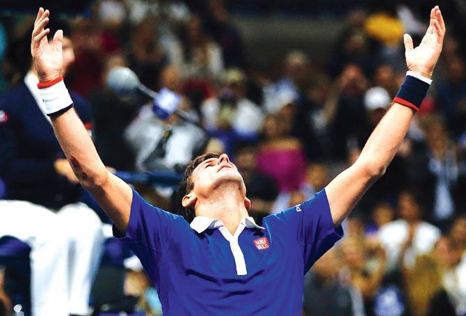 Novak Djokovic reacts after his victory over Roger Federer