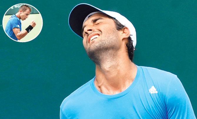 India-s Yuki Bhambri reacts after a point against Czech Republic’s Lukas Rosol at New Delhi’s RK Khanna Tennis Stadium yesterday. Inset: Lukas Rosol. Pics/AFP, PTI