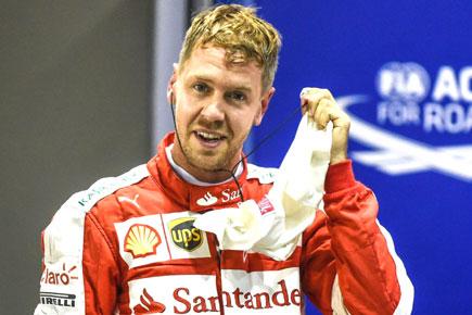 Sebastian Vettel grabs pole in Singapore