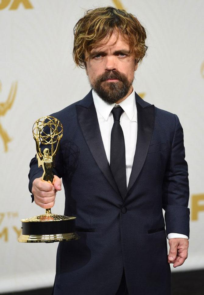 Peter Dinklage arrives in the Press Room with his award for Best Supporting Actor in a Drama at the 67th Emmy Awards on September 20, 2015 at the Microsoft Theater in Los Angeles, California