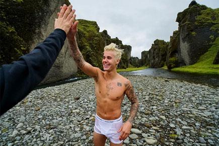 Justin Bieber takes a dip in boxers