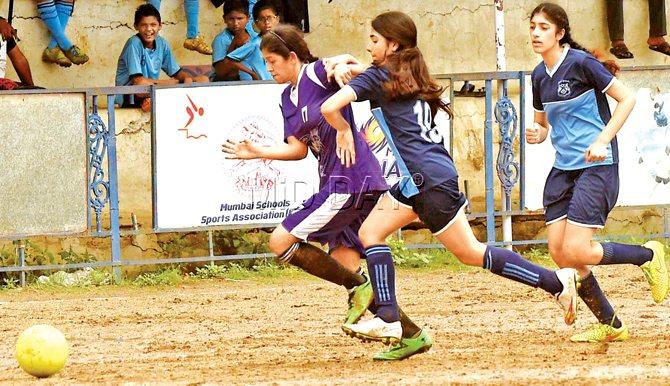 Cathedral & John Connon School’s Muskaan Mehra (left) vies with Bombay Scottish