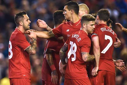League Cup: Liverpool survive scare against Carlisle United on penalties