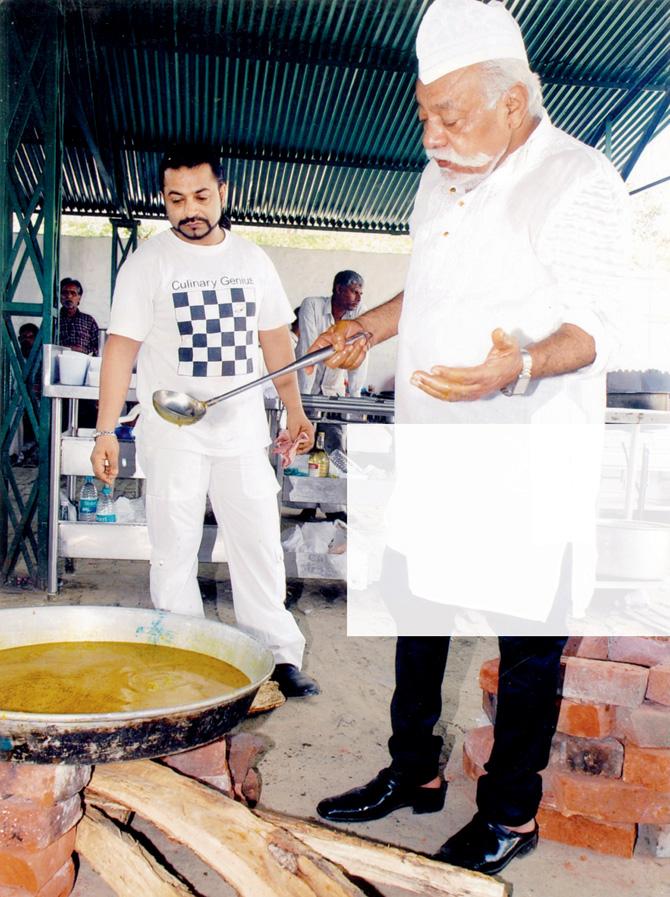 Mohammed Ishtiyaque Qureshi (left) of Kakori House looks on as his father, chef Imtiaz Qureshi prepares Korma at Baradari, Lucknow in 2009. Catering to a large wedding, these preparations were filmed for one of the episodes of Gordon’s Great Escape presented by the popular chef Gordon Ramsay. Pic Courtesy/Ishtiyaque Qureshi