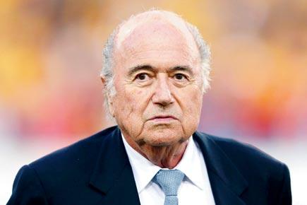 Swiss open criminal proceedings against Sepp Blatter; Platini quizzed