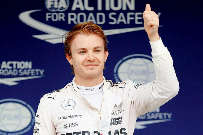 Nico Rosberg celebrates after claiming pole position during qualifying for the Japanese GP at Suzuka Circuit on Saturday. PIC/Getty Images