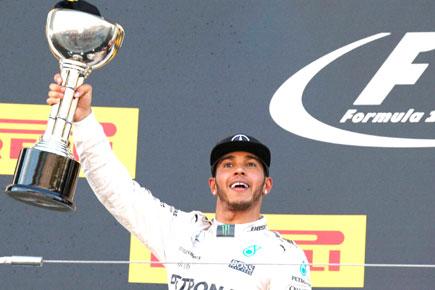 Lewis Hamilton wins Japanese Grand Prix, equals Ayrton Senna's record