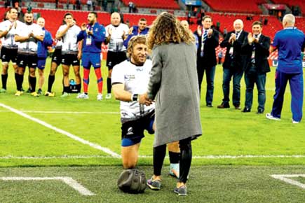 Romanian rugby star proposes to girlfriend after World Cup defeat