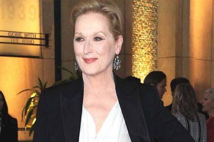 Meryl Streep tries to swim a mile every day