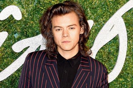A bottle was thrown at Harry Styles on stage