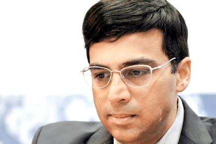Chess: Viswanathan Anand draws with Magnus Carlsen to finish 9th