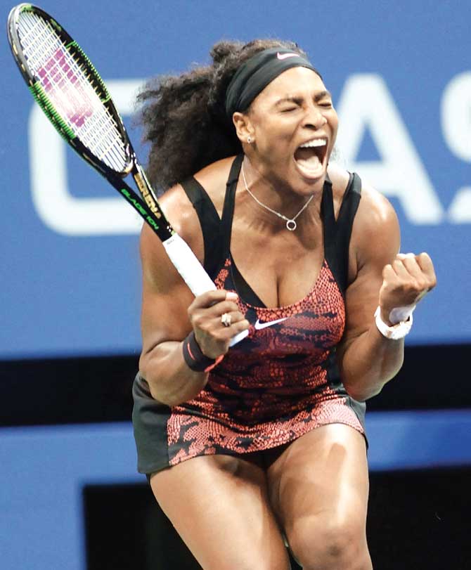 Serena Williams celebrates a point against USA