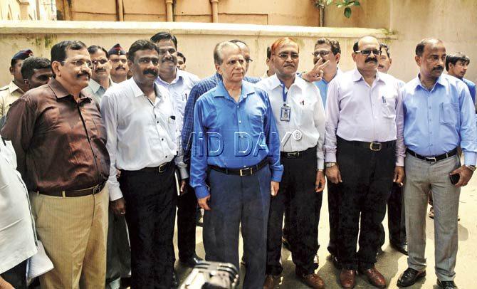 The men behind the conviction: This Anti-Terrorism Squad team had managed to crack the 11/7 blasts case, which culminated in the conviction of 12 od the 13 arrested accused yesterday. Maharashtra did not have an ATS until 2004, just two years before the blasts. K P Raghuvanshi (centre, in blue shirt) was the first Maharashtra ATS chief and he headed the unit during the blasts probe. Pic/Sayed Sameer Abedi