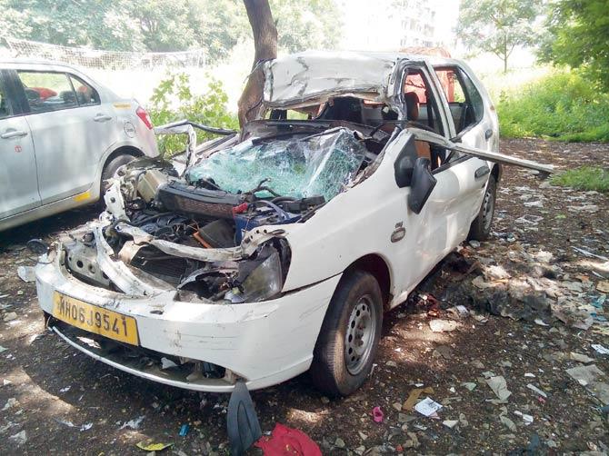 Mangled remains of the Indica car the Manes were travelling in