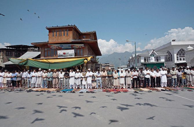 For Mehra, this picture shot at the Hazratbal shrine in Srinagar captures the pulse of the region. “Pigeons represent peace, and in this image, we can only see their shadows, indicating the fleeting nature of peace in the Valley,” he says. 