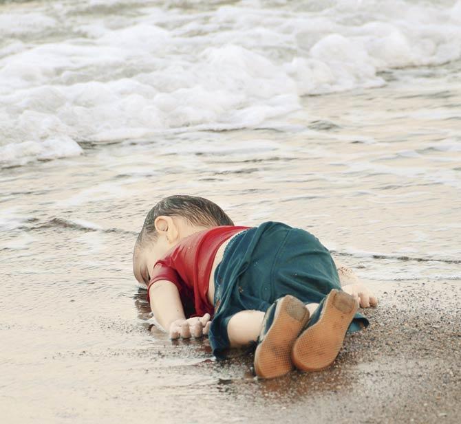 Aylan Kurdi’s lifeless body washed up on a Turkish beach on September 2. Pic/Nilufer Demir/AFP, Dogan News Agency