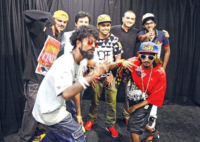 Hip hop groups Dopeadelicz, SlumGods, and rapper Ace pose with Qyuki founder and managing director, Samir Bangara and head of content, Sagar Gokhle. pic/Bipin Kokate