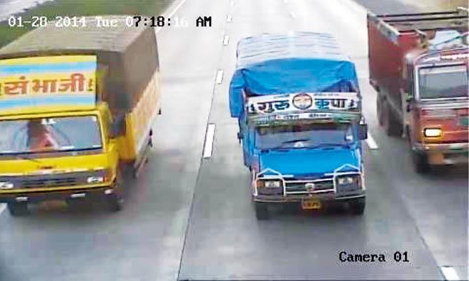 A picture clicked during the survey shows how truck drivers flout lane discipline by driving in the right and the middle lane, instead of keeping left. Pic/Tanmay Pendse