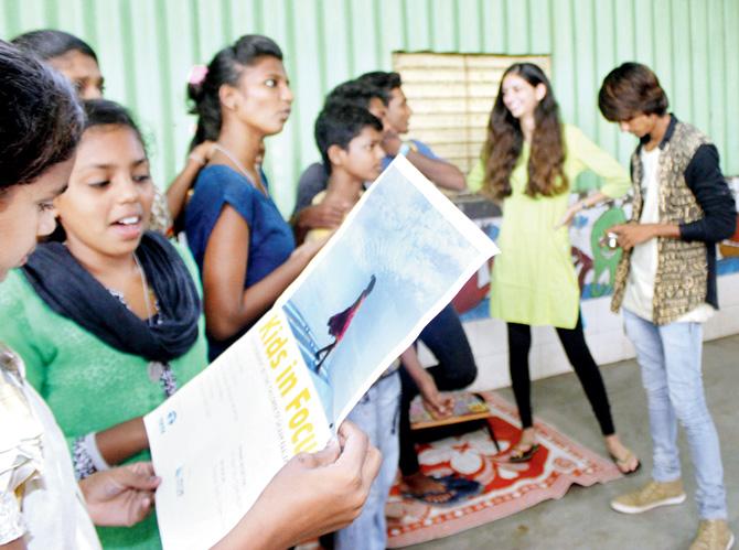 Iyanah Bativala (second from right), a Std XII student, with the Salaam Balak Trust children at Bal Bhavan, Chowpatty. PIC/TUSHAR SATAM