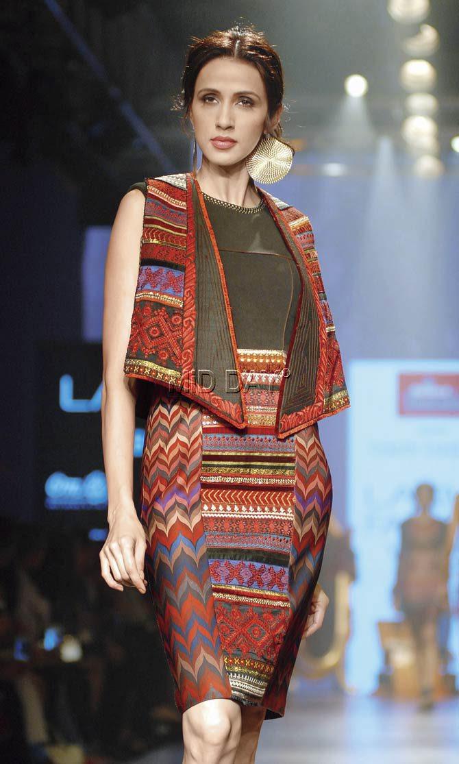 Alesia Raut in a pencil skirt inspired by Russian gypsy elements