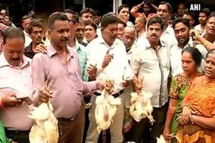 MNS workers sell chicken in Dadar in protest against 4-day meat ban in Mumbai 