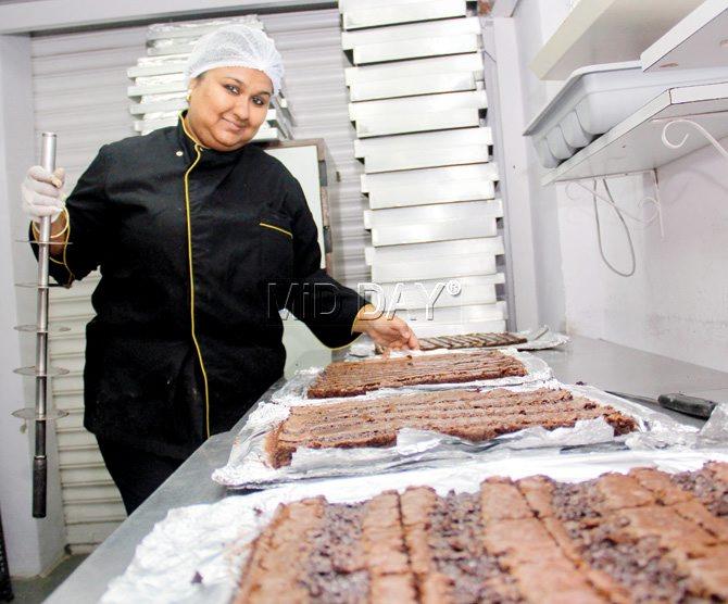 Prache Goel, founder of Brownie Cottage, inspects freashly baked Belgian chocolate brownies. pic/sharad vegda 