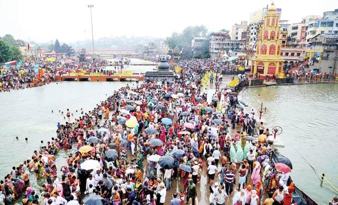 Since August 26 this year, around 80 lakh people have taken part in the five Shahi Snans (holy baths) at Nashik and Trimbakeshwar. Pic/PTI